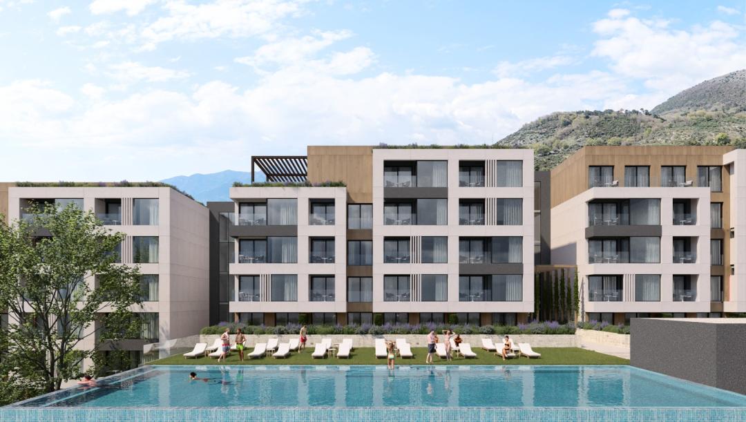 <p>The project is a brand-new project in Tivat, strategically situated only 2km away from city centre, and surrounded by greenery and beautiful landscape. The development offers a unique living experience that combines modern luxury with the serenity of nature.<br>The elevated position of the location allows residents to enjoy panoramic vistas and a sense of tranquility that comes from being nestled in the lush Mediterranean nature.</p><p>Prime plot location abundant in surrounding greenery whilst located only 2.5km from Tivat City Centre and Porto Montenegro. Elevated plot (+100m above sea level) maximizing apartment views of the sea and park</p><p>800m from Tivat waterfront and nearby beaches easily accessible walking or driving </p><p>Secure and regulated plot ensuring for privacy and tranqulity<br>Access to three international airports: Tivat International Airport(1.3km), Podgorica International Airport (88km) and Dubrovnik International Airport (52km)</p><p>Mixed-use development offering apartments and retail stores on ground floor level<br>Convenient location abundant in greenery and in proximity to Tivat centre<br>Exclusive amenities for residents only providing for a complete living experience<br>A careful selection of retail stores catering to residents’ day-to-day needs<br>Regulated development with maintenance and maximum security</p><p>The architectural design of The project reflects a commitment to modern aesthetics and functional living spaces. The residences are thoughtfully designed to maximize natural light and offer panoramic views of the surrounding greenery. These spacious apartments feature high-quality finishes and fixtures, ensuring both comfort and elegance.<br>The project goes above and beyond to enhance your quality of life. Residents have a wide range of amenities onsite including convenience retail, while also enjoying easy access to Tivat town and all the offerings of the Tivat Riviera.</p><p>PROPERTY HIGHLIGHTS<br>Grund floor + 4 storeys<br>A total of 133 residences in studio and one- to five-bed configurations<br>Modern design with expansive windows maximizing natural light<br>Panoramic park, mountain and sea views from upper units<br>Exclusive residents-only amenities<br>Premium finishes and specifications<br>Designated driveway and entrance to the project<br>Secure underground parking and storage units</p><p>Large outdoor swimming pool at ground floor level and rooftop swimming pool in building B<br>Children’s playground<br>Gym and running track<br>Ground floor retail catering to residents, including a supermarket and a pharmacy<br>Facility management<br>Reception and CCTV system</p><p> </p><p>Specifications and finishes<br>Multi split heating and cooling system in all rooms (A+) by Carrier<br>French manufactured wooden flooring (one strip)<br>Bespoke façade surfaces by German manufacturer STO<br>Double-glazed aluminum window and external door frames<br>Italian ceramic tiling in kitchens and bathrooms<br>Laufen washbasins, toilets and sanitary furniture<br>Hansgrohe sanitary fixtures<br>Integrated furniture packages available on request</p>