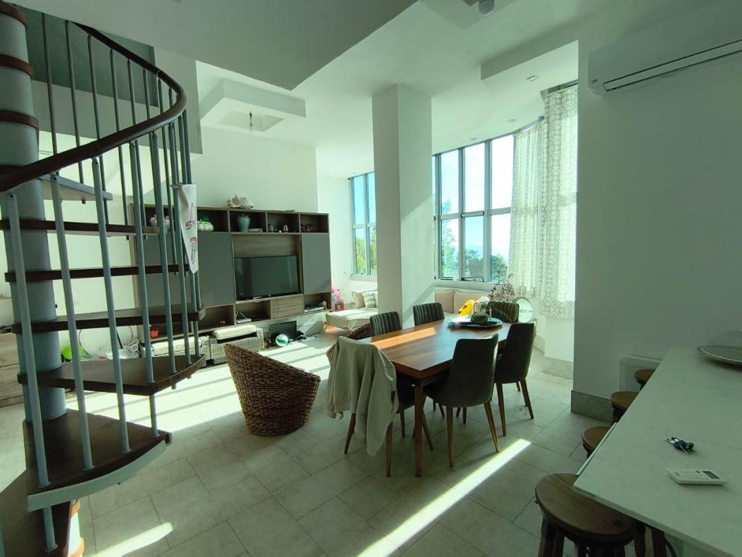 <p>The triplex is located in the Golem area. The property has a total area of 260 m2, where the first floor has 130 m2 where it is distributed in a corridor, a kitchen, a bedroom and a toilet, it is also surrounded by glass windows while the second floor has 51m2 and is called a basement where it is distributed in a bedroom and a toilet and a storage room while the third floor has 83 m2 net based on the reference where it is also distributed in a spacious space. The property also has an addition in the upper part of the terrace where it can be used as a veranda of 83 m2 for use only by this apartment. It is located in a popular residential area that offers tranquility and comfort. <br><br>For more information or a visit to the property, please contact us!</p>