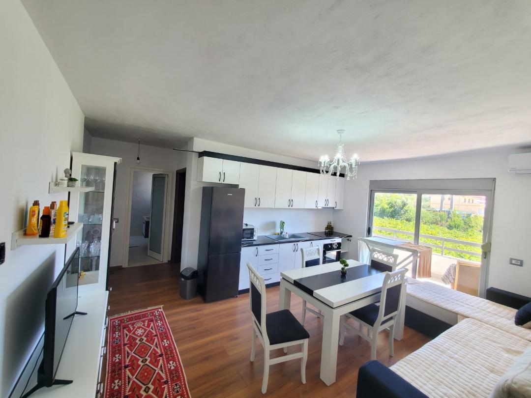 <p>The apartment is located on the 4th floor of a new building with an elevator, above the highway about 150 meters from the sea at Shkembi i Kavajes. It has a total of 60m2 and 55m2 of interior space which is organized into a corridor that distributes the spaces into a living room + kitchen, 1 bedroom, 1 bathroom, and 1 balcony. The apartment is fully renovated and fully furnished with modern conditions. <br><br>For more information or a property visit, please contact us!</p>