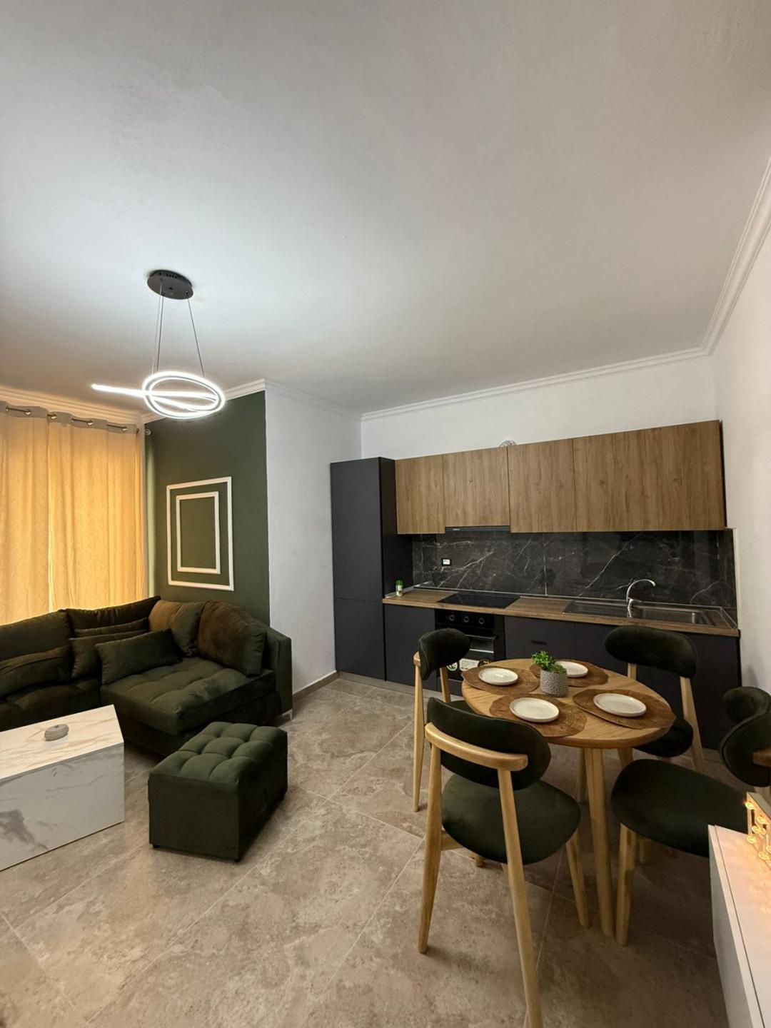 <p>The apartment is located on the first residential floor of a building in the Shkembi area of Kavaja. It has a total of 52m and 46.4m of interior space, which is organized into a corridor that distributes the rooms into a living room + kitchen, 1 bedroom, 1 bathroom, and 1 storage room. The apartment is furnished and sold as shown in the photos. The property also includes a parking space. It is located in a desirable residential area, about 250m from the sea, and offers all the facilities for a comfortable and convenient life. The property has proper legal documentation and is ready for sale.<br><br>For more information or to schedule a visit to the property, do not hesitate to contact us!</p><p> </p>