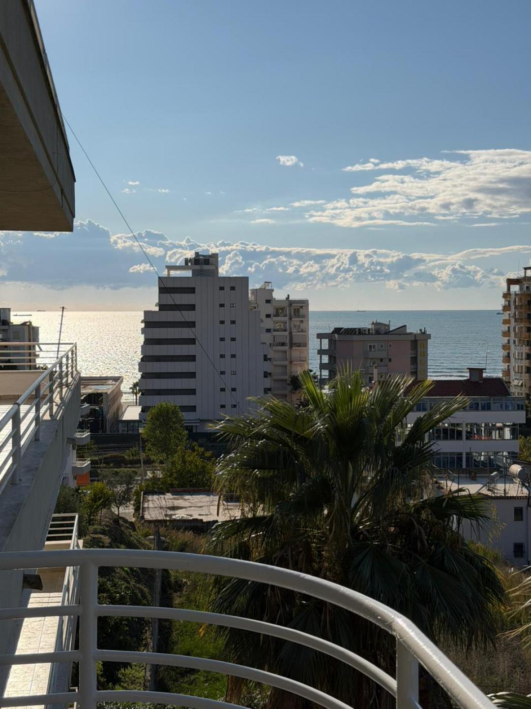 <p>The apartment is located on the first residential floor of a building in the Shkembi area of Kavaja. It has a total of 120 m² and 99.7 m² of interior space organized into a corridor that distributes the rooms: a living room + kitchen, 2 bedrooms, 1 bathroom, and 1 veranda with a sea view. The apartment is furnished and sold as shown in the photos. The property also includes a parking space. It is located in a preferred residential area, about 300 meters from the sea, and offers all the facilities for a comfortable and convenient lifestyle. The property has proper legal documentation and is ready for sale. For more information or to schedule a visit, do not hesitate to contact us!</p>