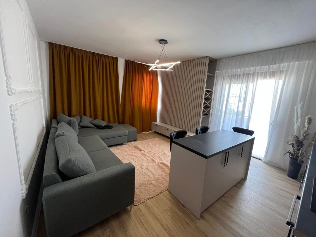 <p>Located on the 7th floor of a well-maintained building with elevator in the highly desirable Plazh Hekurudha area, this beautiful apartment offers comfort, style, and an excellent location near the sea.</p><p>The property has a total surface area of 85 m² (74 m² registered in the ownership certificate). The interior layout is thoughtfully organized and includes a bright living room combined with a modern kitchen, two comfortable bedrooms, one bathroom, and a spacious balcony.</p><p>The apartment has been completely renovated and is furnished in a contemporary style, ready for immediate move-in. Large windows provide natural light throughout the space, creating a warm and inviting atmosphere.</p><p>Situated in one of the most preferred areas for both summer holidays and long-term living, the property is close to the beach and all necessary services.</p><p>For more information or to schedule a property visit, please contact us.</p>