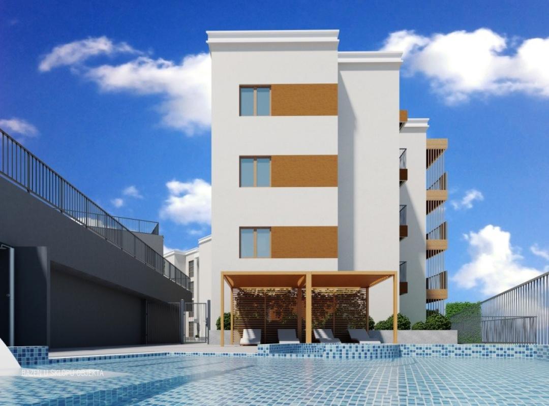<p>New premium apartments in a complex with a swimming pool and children’s playground in Tivat, Kava district.</p><p>The gated complex consists of two buildings.</p><p>Building A includes 15 residential apartments. Apartments on the ground floor have access to a fenced green courtyard, which guarantees privacy and comfort.</p><p>Lamele B, consisting of 16 apartments, is designed to provide comfortable and safe living for families with children. One of the attributes of this building is an equipped children’s playground with soft surface. The ground floor apartments of this also have the advantage of access to a private landscaped courtyard.</p><p>Garage – 33 parking spaces. There is a charging station for electric vehicles at the entrance to the garage. In addition to parking spaces, the garage provides additional storage space.</p><p>&nbsp;</p><p><i>Project Features</i></p><p>The living rooms of all apartments open onto spacious furnished terraces.</p><p>In the bathrooms, marble-effect porcelain stoneware is used on the floors. Bathrooms in residential buildings are fully equipped with sanitary fittings, a built-in shower and adapted built-in wardrobes.</p><p>To ensure comfort, heated floors are installed in every part of the apartment: hallway, bathroom, living room and bedroom. In the living rooms and bedrooms, wood effect ceramics are used for flooring, which fills the space with light and warmth.</p><p><i>The main advantage of the complex is the high quality of construction.</i></p><p>High-quality sound and heat insulation, multi-layer floor insulation. The building is equipped with the KBE 88 window and door system from the famous German manufacturer Kömmerling GmbH.The windows have golden oak-colored blinds and mosquito nets.</p><p>LG air conditioners with advanced smart remote control function. On the roofs there are photovoltaic panels with a capacity of 3-5 kW. Due to this, residential buildings are largely independent from the power grid. If more electricity is produced than consumed, at the end of the year a settlement is made using a two-way meter with SEDIS, and the excess electricity produced is credited to the residential premises account.</p>