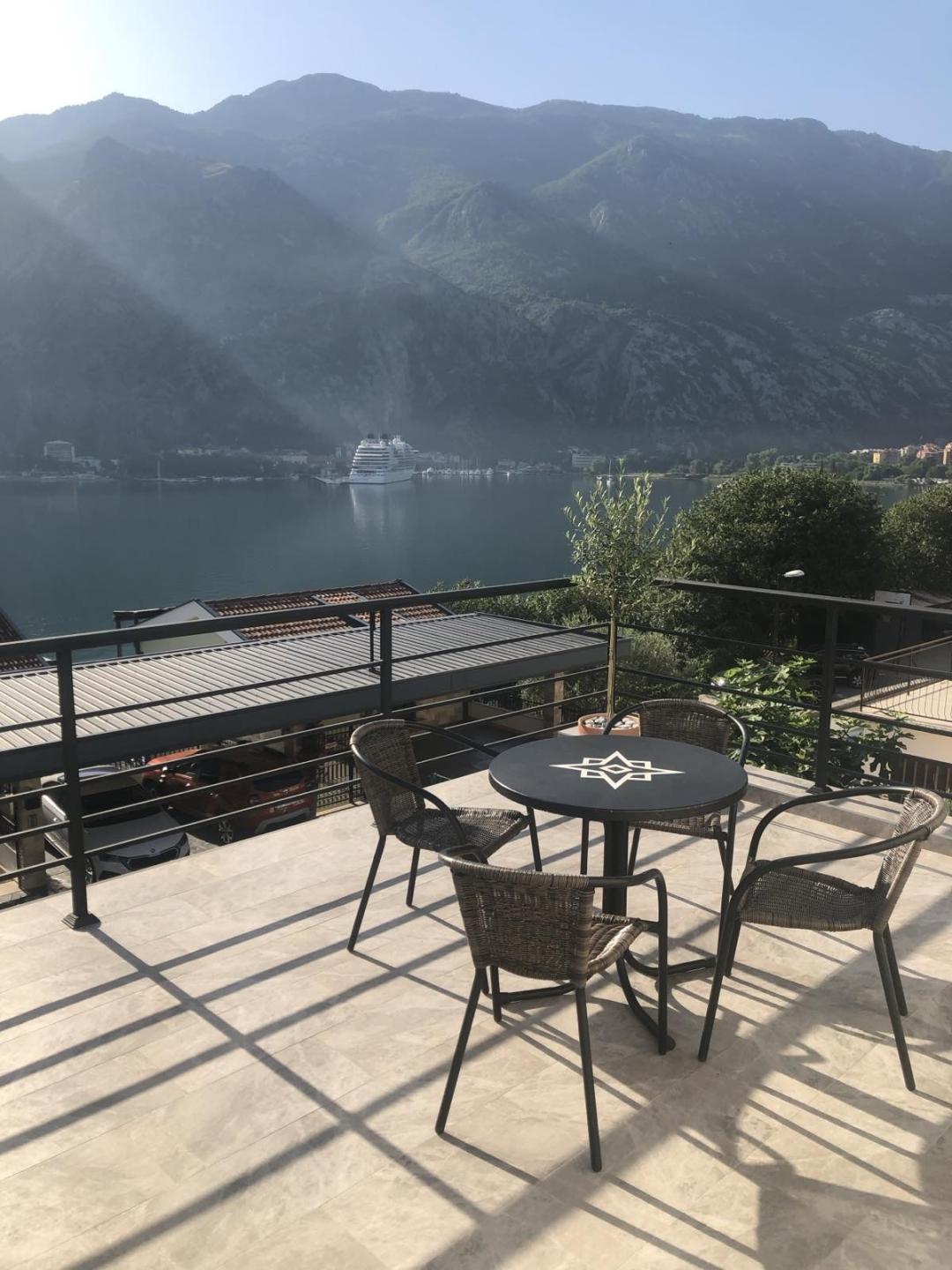 <p>The quiet village of Muo, a suburb of the ancient coastal town of Kotor, is 2 km from the Old Town and 7 km from Tivat Airport. The house is located on a slight hillside, 50 meters from the coastline. The house consists of two floors. The total area of ​​the house is 72 m² + a 32 m² terrace. The land area is 527 m², with greenery. All city utilities are available. Good road access to the house.<br><br>The ground floor features an apartment consisting of a bedroom, living room with dining area, kitchen, and bathroom. The second floor features an apartment with two bedrooms, a large living room, kitchen with dining area, hallway, bathroom, and terrace.<br><br>High-quality interior finishing. Furniture and appliances are included.<br>&nbsp;</p>